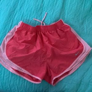 Peach Nike shorts